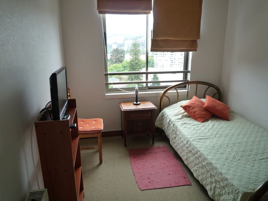 Dormitorio cama plaza y media