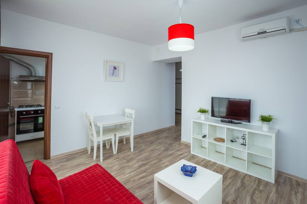 The living room is equipped with sofa and 2 armchairs premium leather , lighting furniture, coffee table, LCD TV and air conditioning.