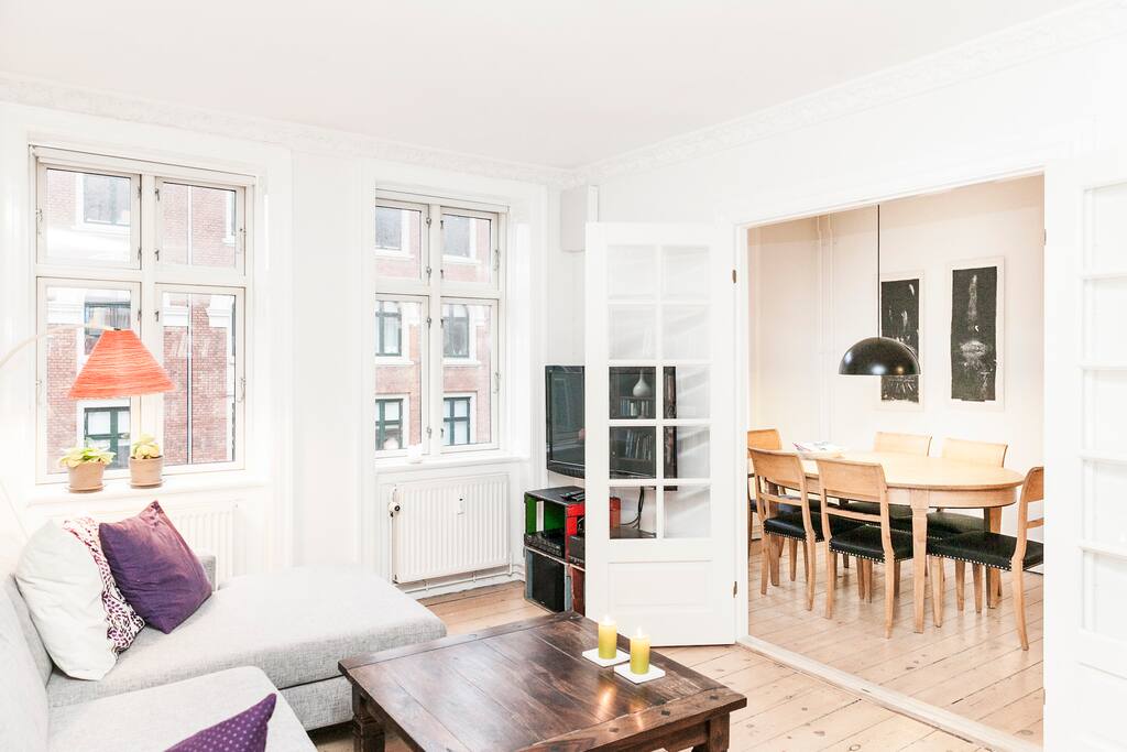 Living room with view into dining room