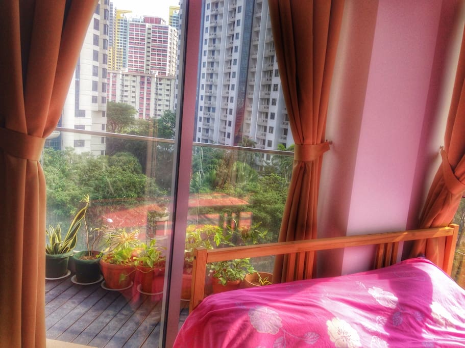 A private balcony attached to your room overlooking the city.
