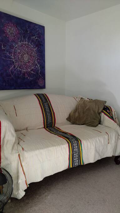 Loveseat in the room