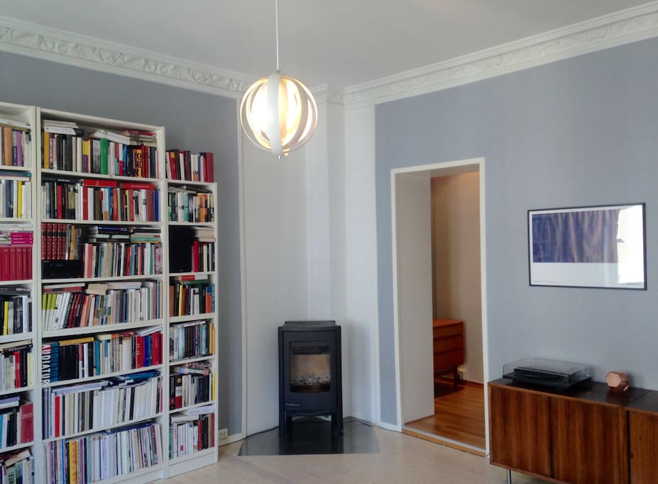 The living room has a cozy fireplace for use in the autumn and winter
