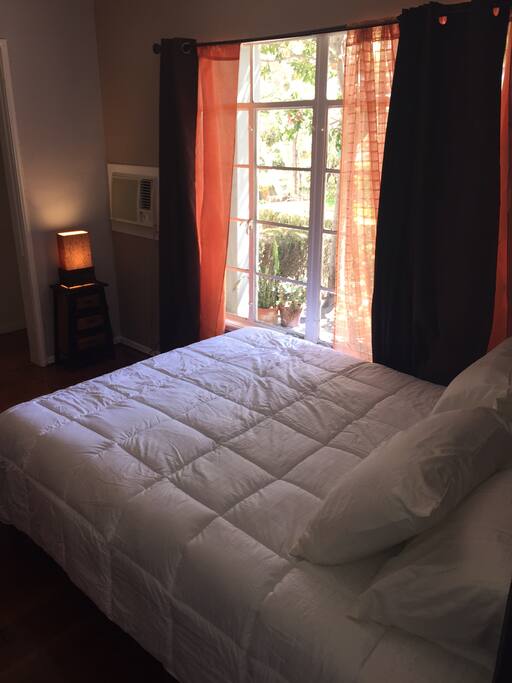 GORGEOUS BED AND FRONT WINDOW