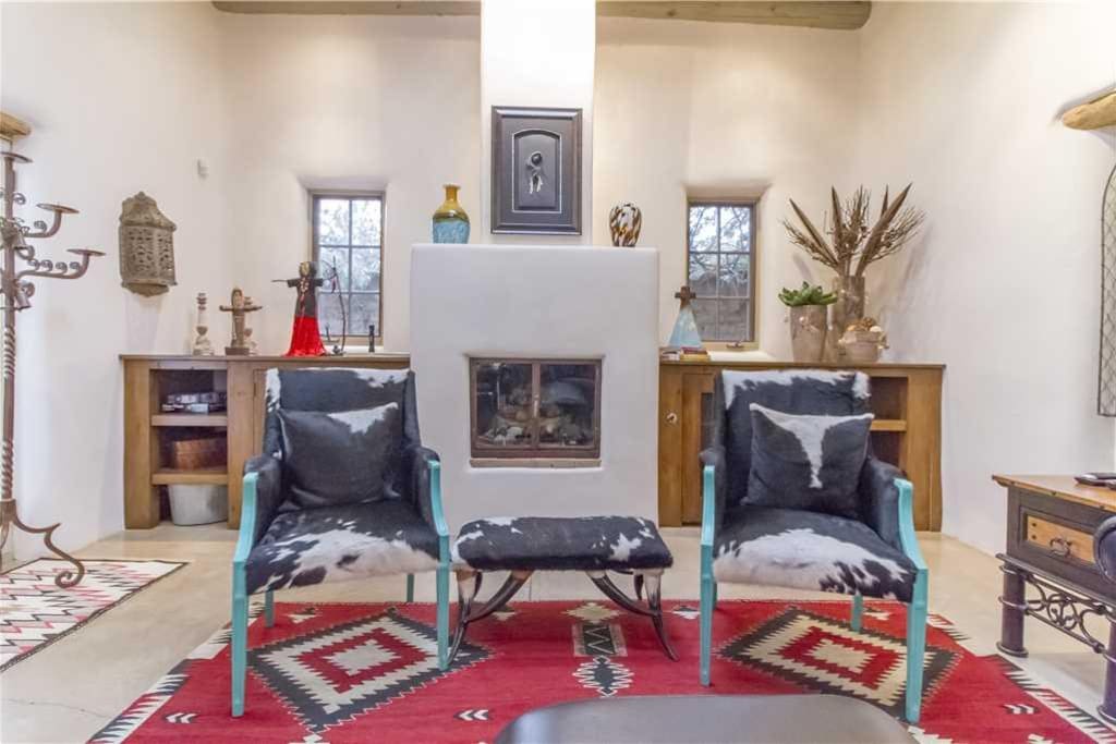 Choose your favorite - Grab a book or magazine and enjoy the warmth of the living room fireplace.