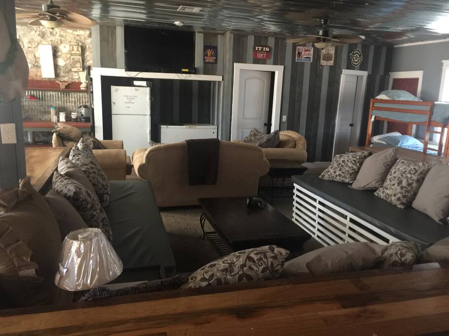 1/2 bath, two chairs and love seat and 55”tv with dish, sectional to sit 12
