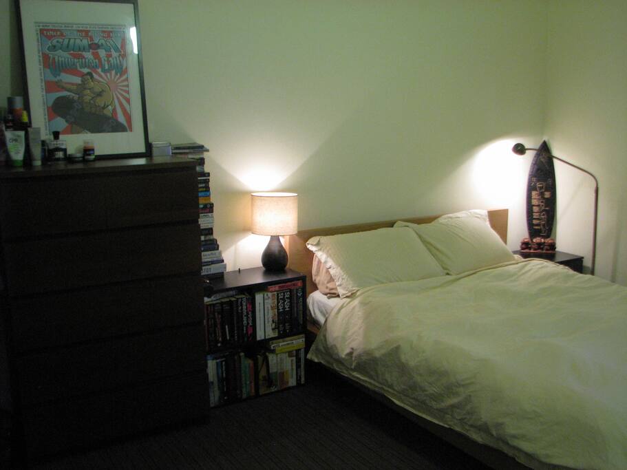 Super comfy queen size bed with reading lights.