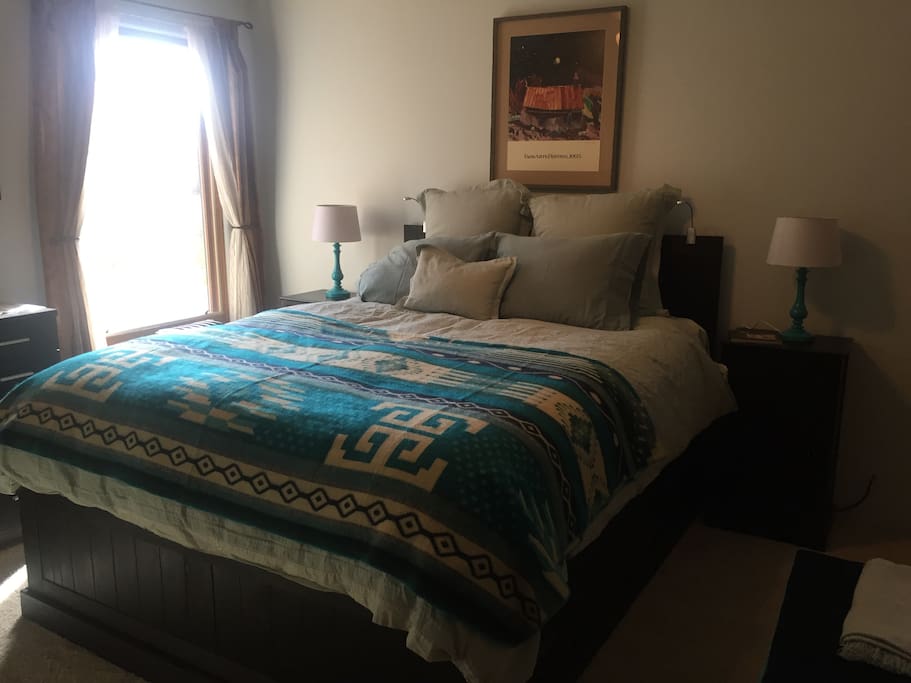 Platform queen bed with reading lamps