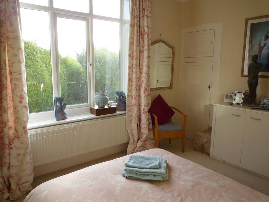 Bedroom and view to side garden