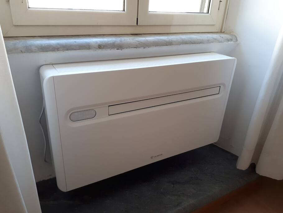air conditioning in the bedroom and in the living room