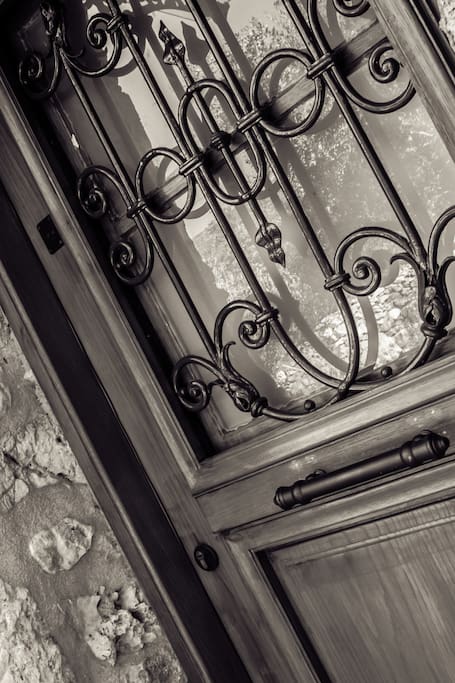 Same door but taken from a different angle, and light, knock knock again...The railing door goes back to the year 1870!