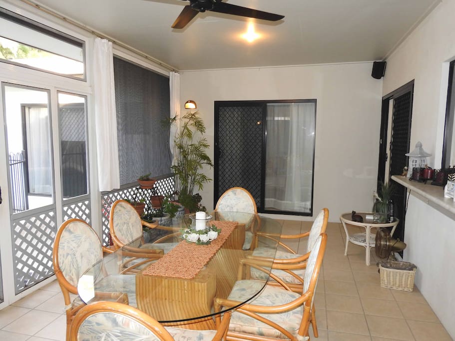 Casual dining in our fully enclosed patio overlooking the pool