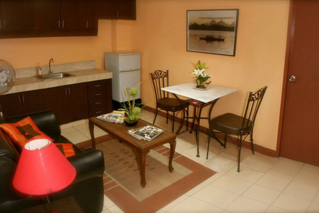 This is the dining room and living room. The kitchenette has everything you need to make and enjoy a delicious home-cooked meal.