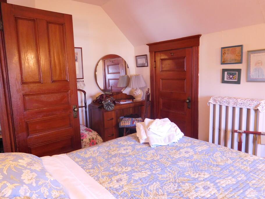 Your bedroom with queen bed and attached bathroom