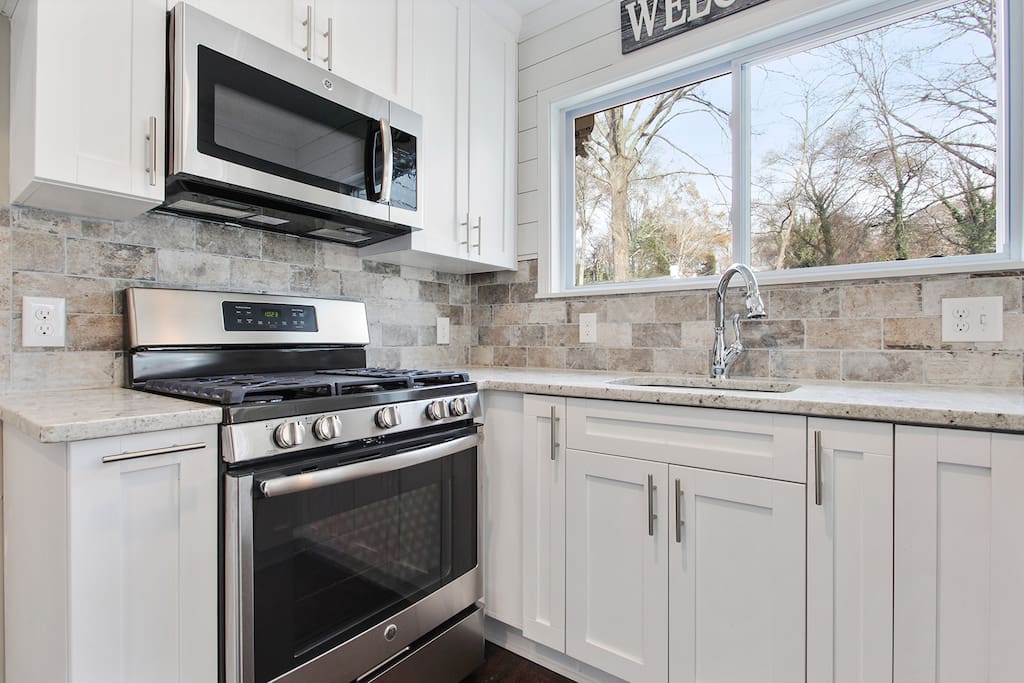 Newly renovated in 2018, this kitchen is just as shiny in person!