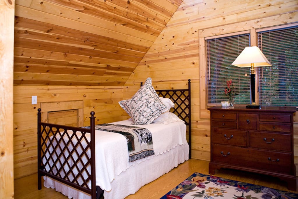 The twin bed loft is above the living room and has a half bath