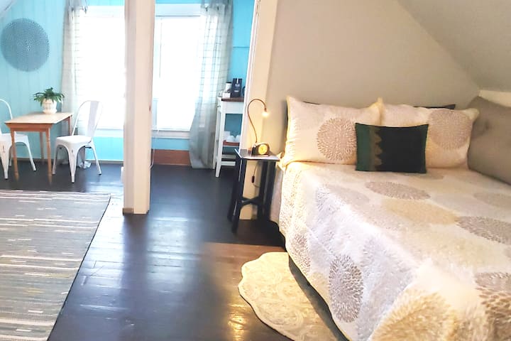 One of two full-size comfy beds with high-quality, ventilated memory foam mattress