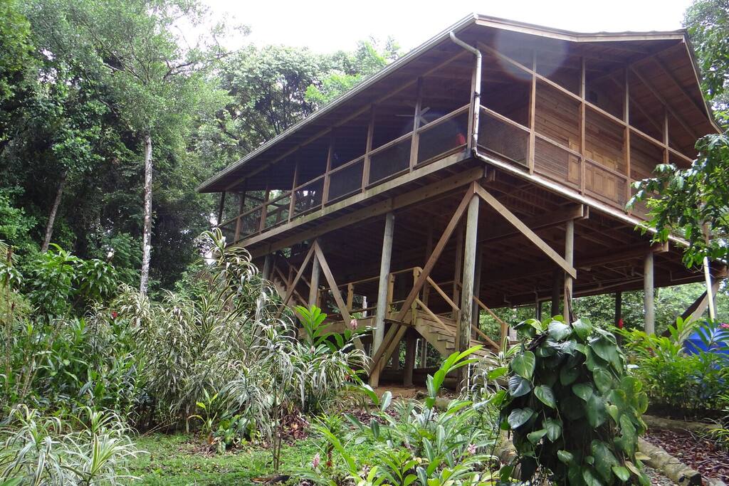 View of the house as seen from the path, walking up from the dock.