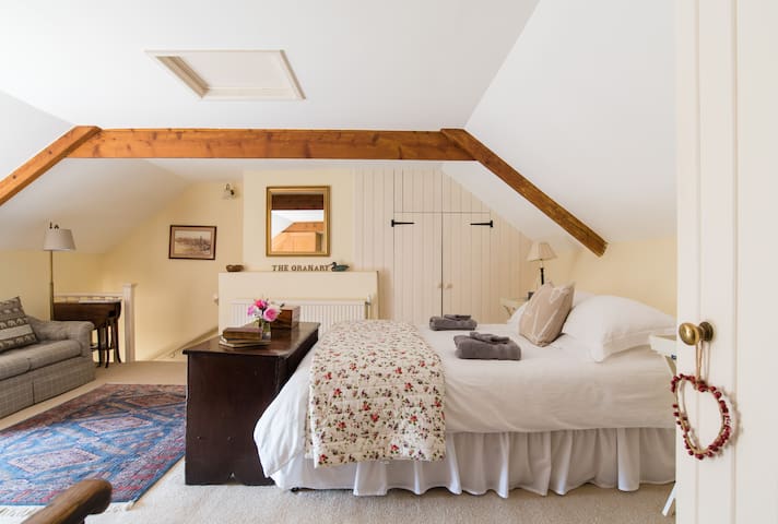 Comfortable large ensuite bedroom in old farmhouse