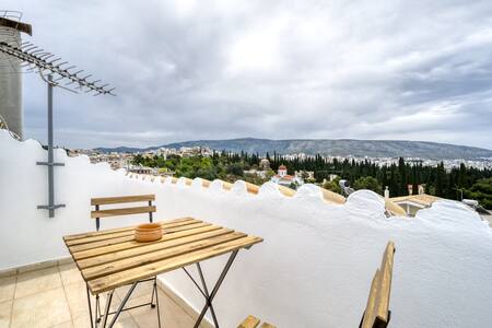 Sunny attic Acropolis great view from the roof