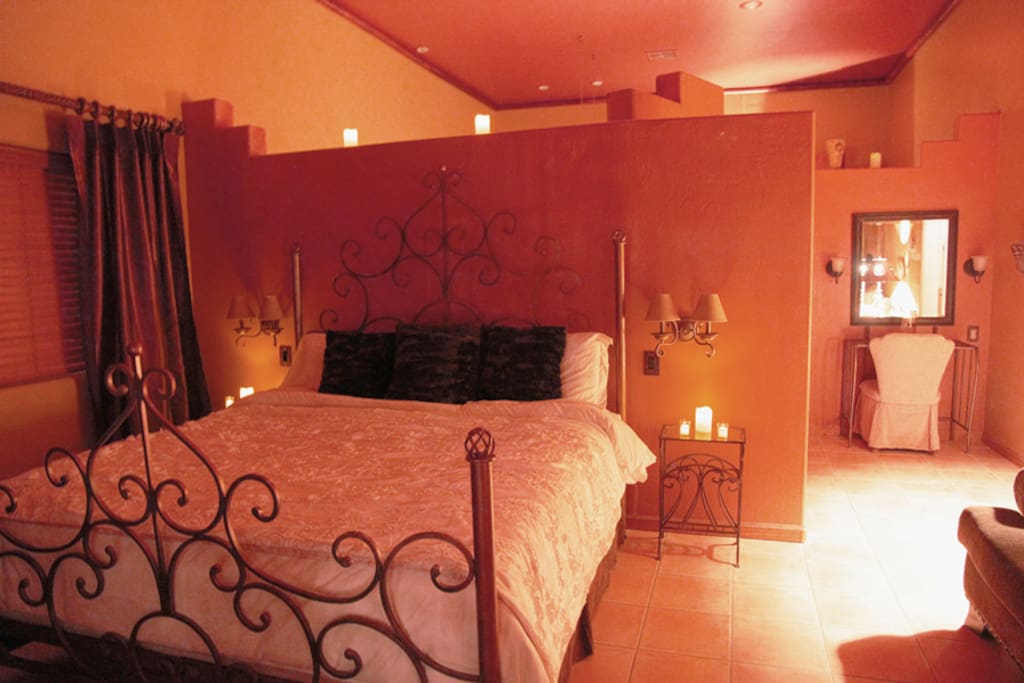 king size bedroom with sofa and Amoire ; large Mexican Amoire Televison, Stereo, Wifi