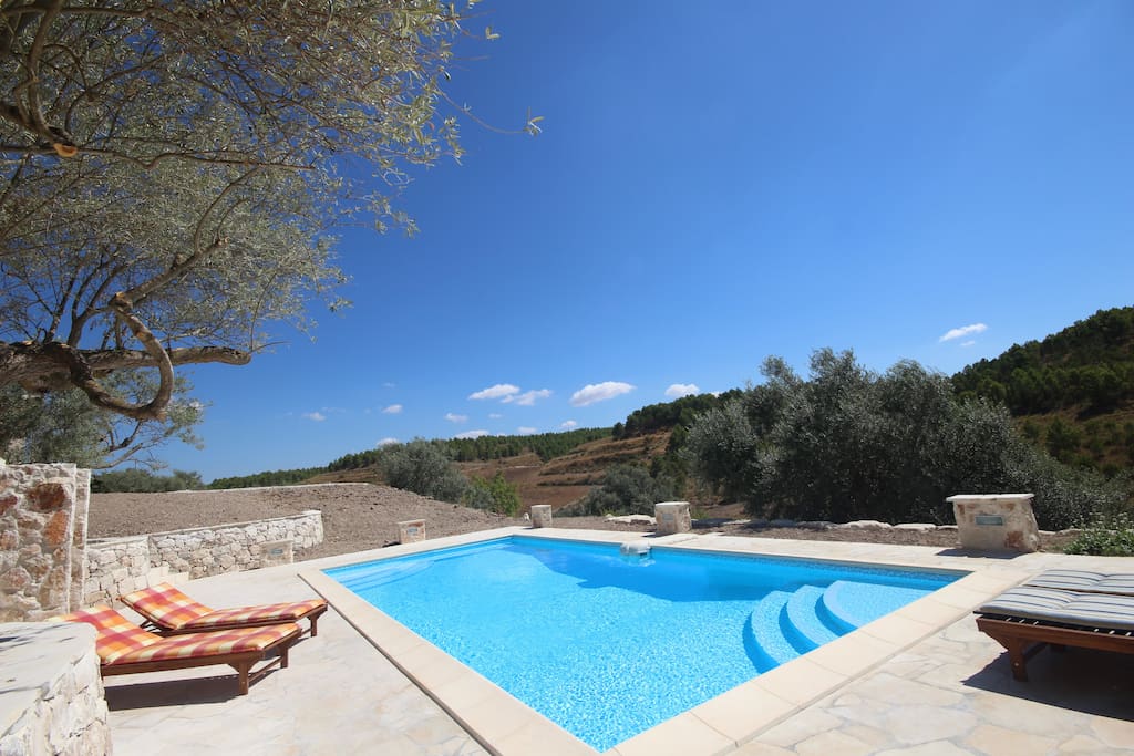 Relax by the pool, direct sunlight all day long.