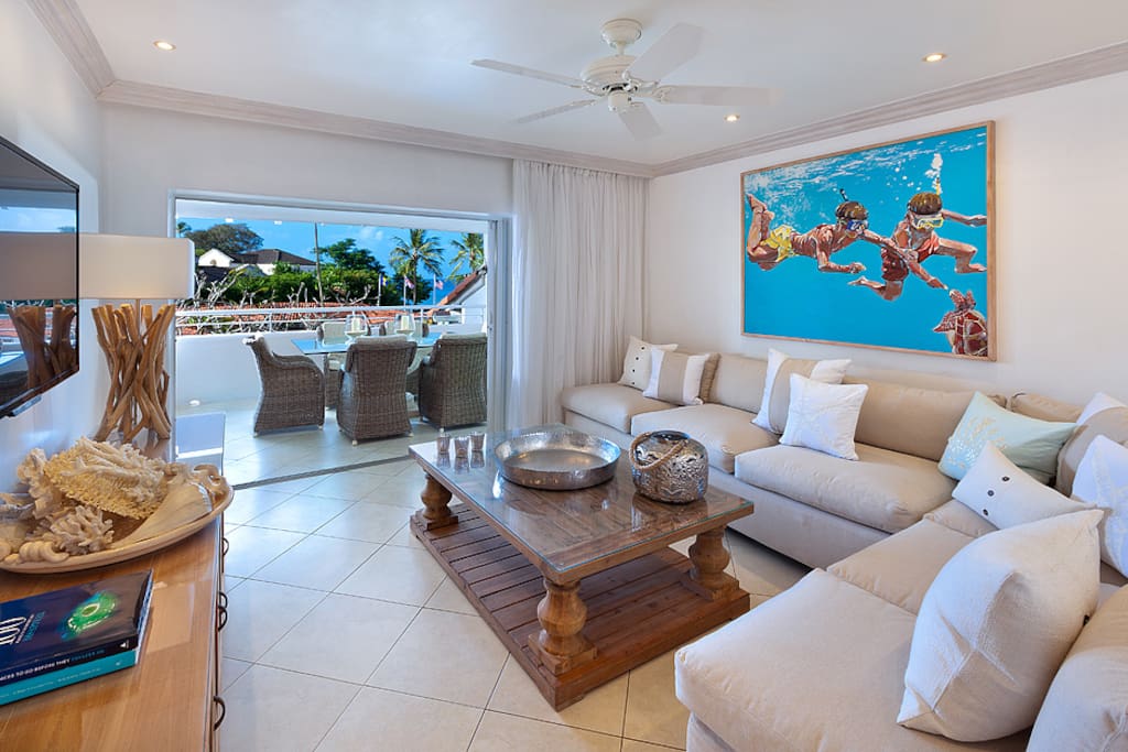 Contemporary living space with large TV.