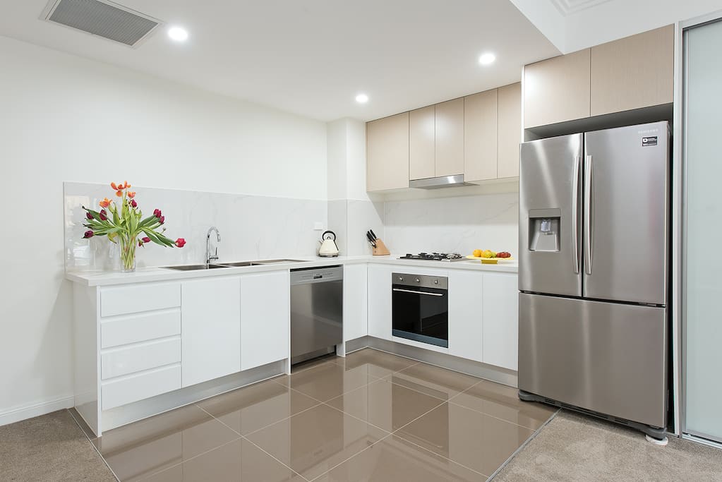 Feeling hungry? Enjoy the open plan kitchen with brand new appliances.