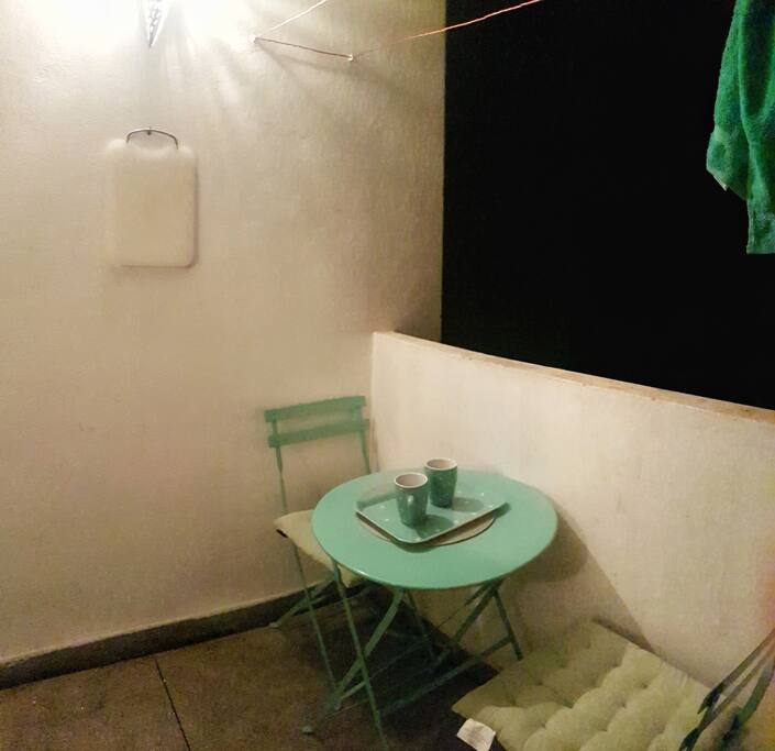 A nice table in the balcony, to enjoy a healthy breakfast in the morning or a drink in the night.