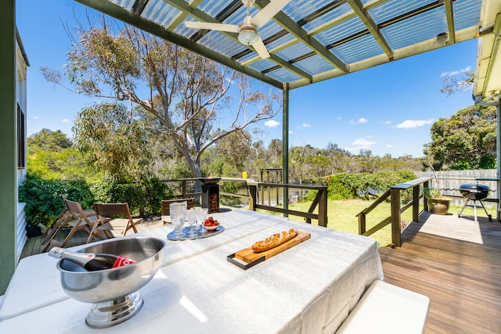 Spacious riverfront beach house getaway
