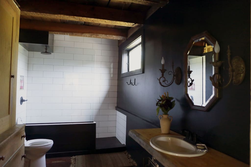 We put a lot of love into the bathroom, installing a walk-in shower with a rain shower head. It's pretty luxurious - if we do say so ourselves!