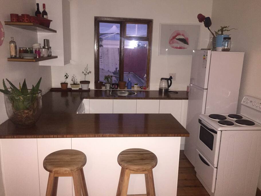 Kitchen with eat-in counter.