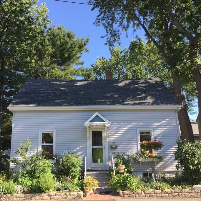 1900 Cape Cod. Soft breeze, shady, no traffic, next to a sweet park. Guest bedroom upstairs, on right.