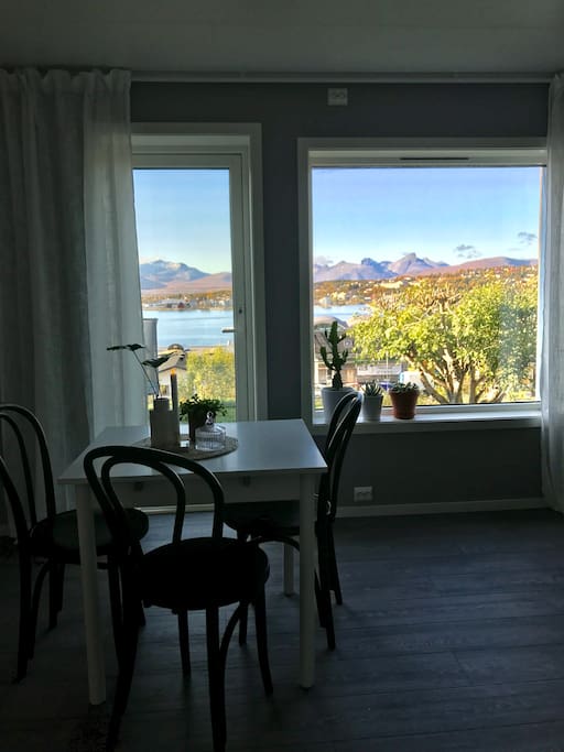 Enjoy a stunning view from the dinner table. From here you can sit and enjoy northern lights, midnight sun and see the boats sailing into Tromsø.