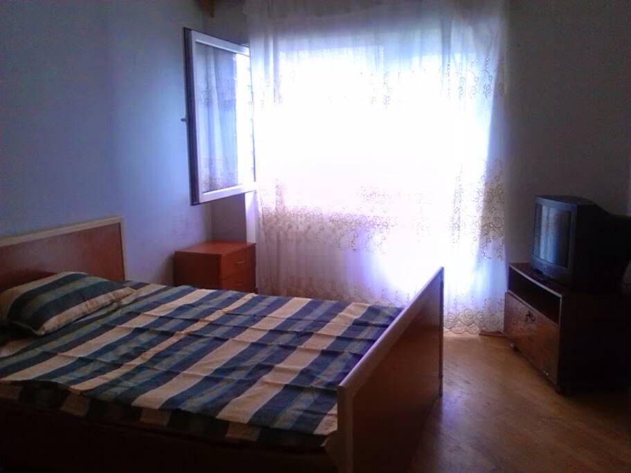 Bedroom with a balcony