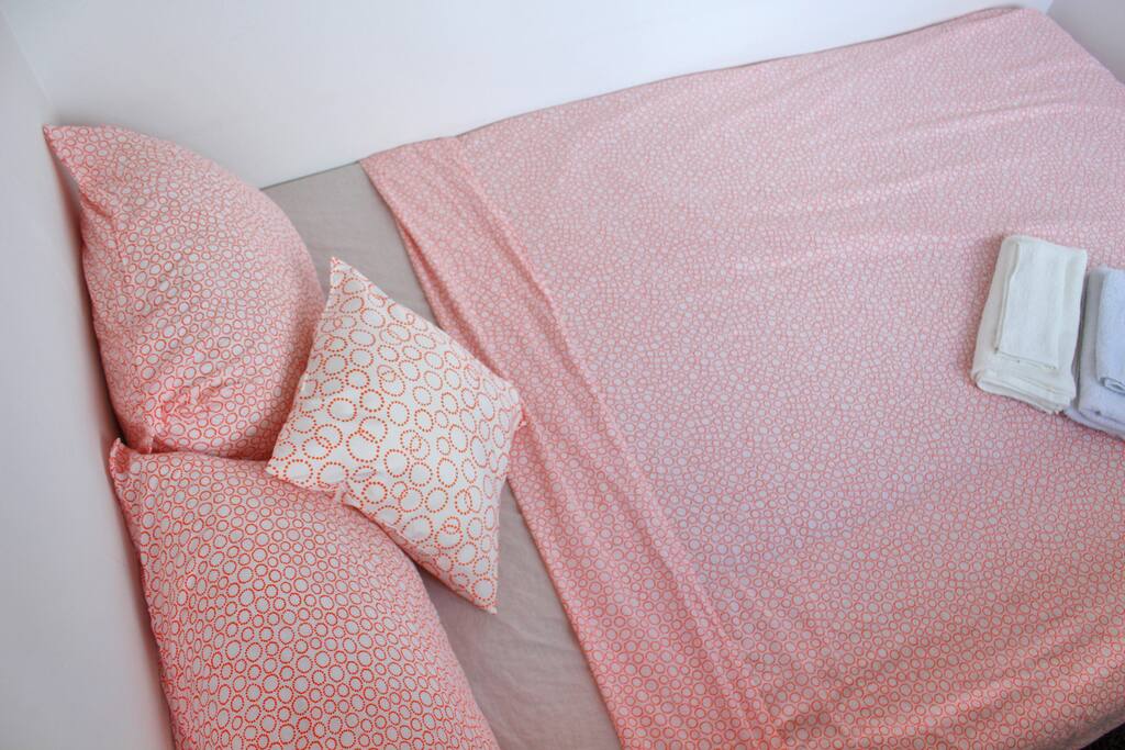 Bed fits two adults.