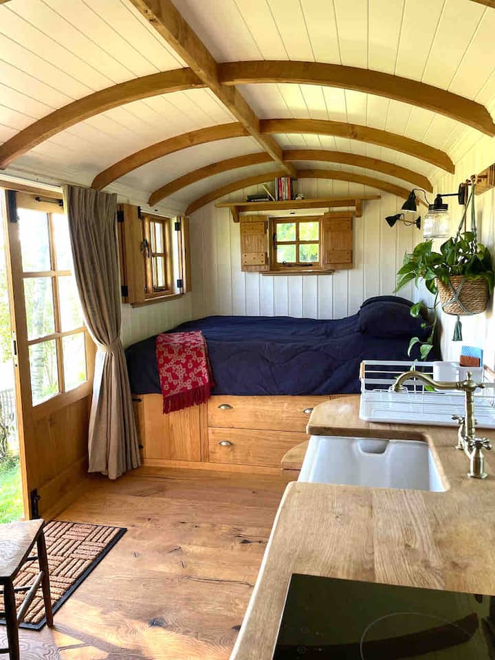 Bed area with drawer storage underneath.