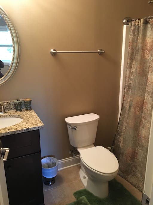 Private bathroom with shower.