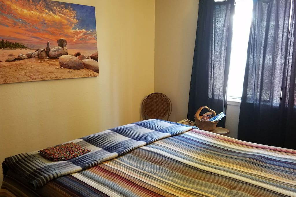 Original Lake Tahoe artwork by a local artist adorns the wall of your bedroom reminding you of what awaits outside of the window