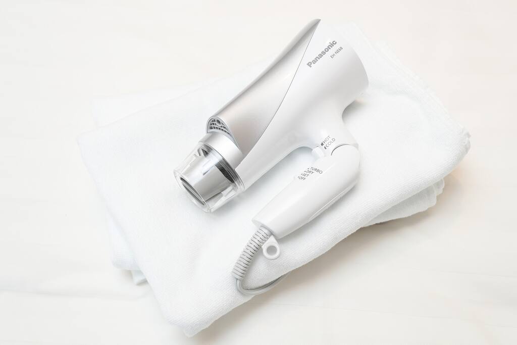 Hair dryer and towels provided.