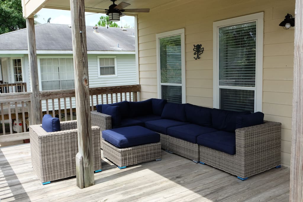 Large patio with luxury furniture to relax and enjoy the breeze from Clear Lake only one block away.