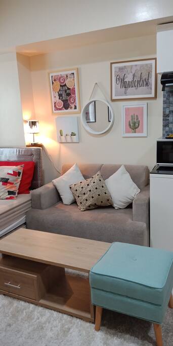 comfortable couple sofa with center table and carpet