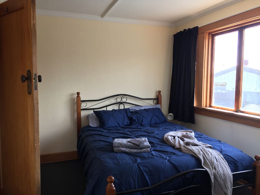 Double bed in upstairs room.