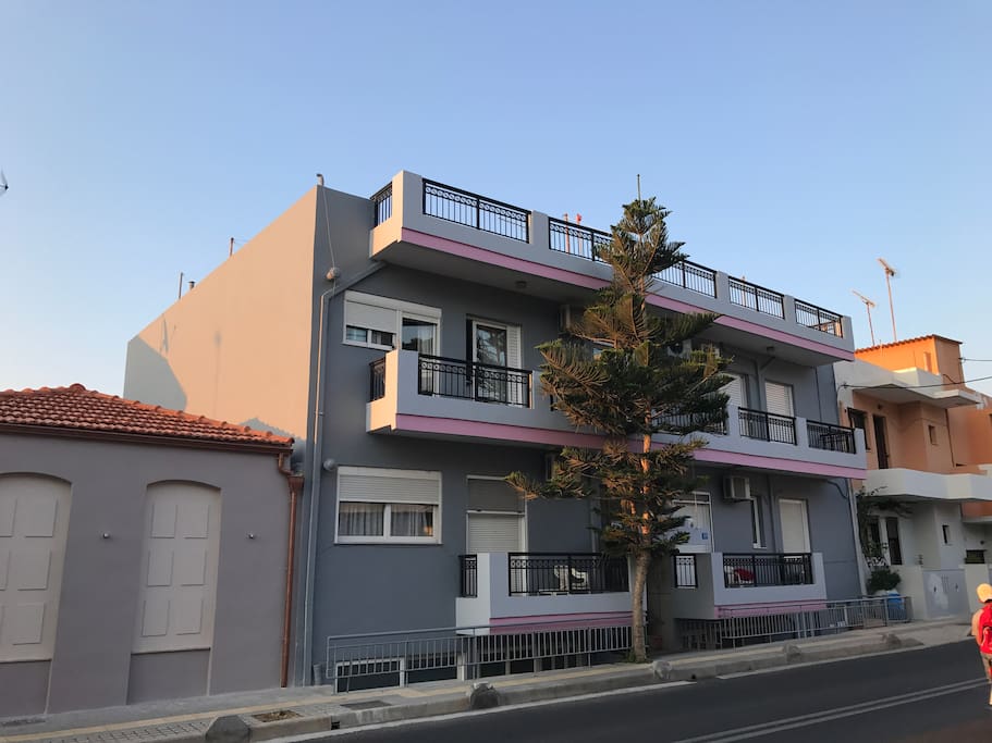 This is the street side of the building. Apt10 has a street door which is lower than the street lever right under the lower-right balcony. Street level is higher than the garden and sea levels.