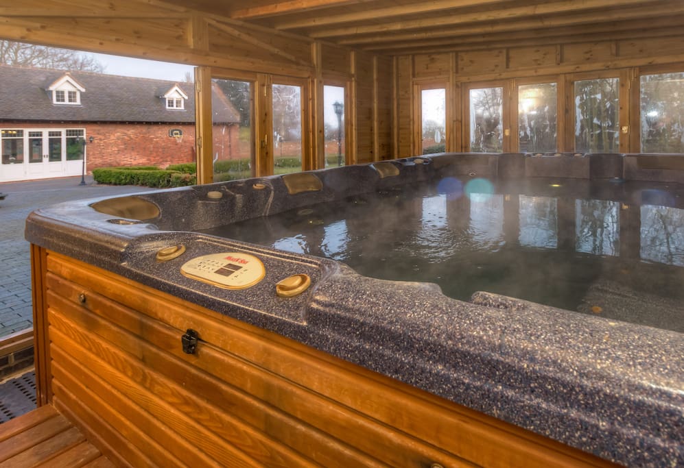 12 foot swim spa in a purpose built garden house for use all year round