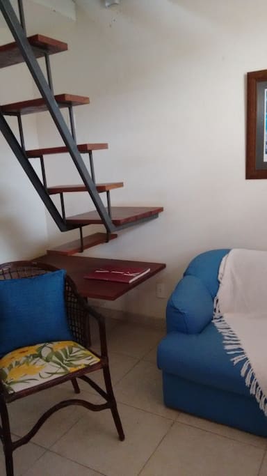 Stairs to the mezanino where the bedroom is.