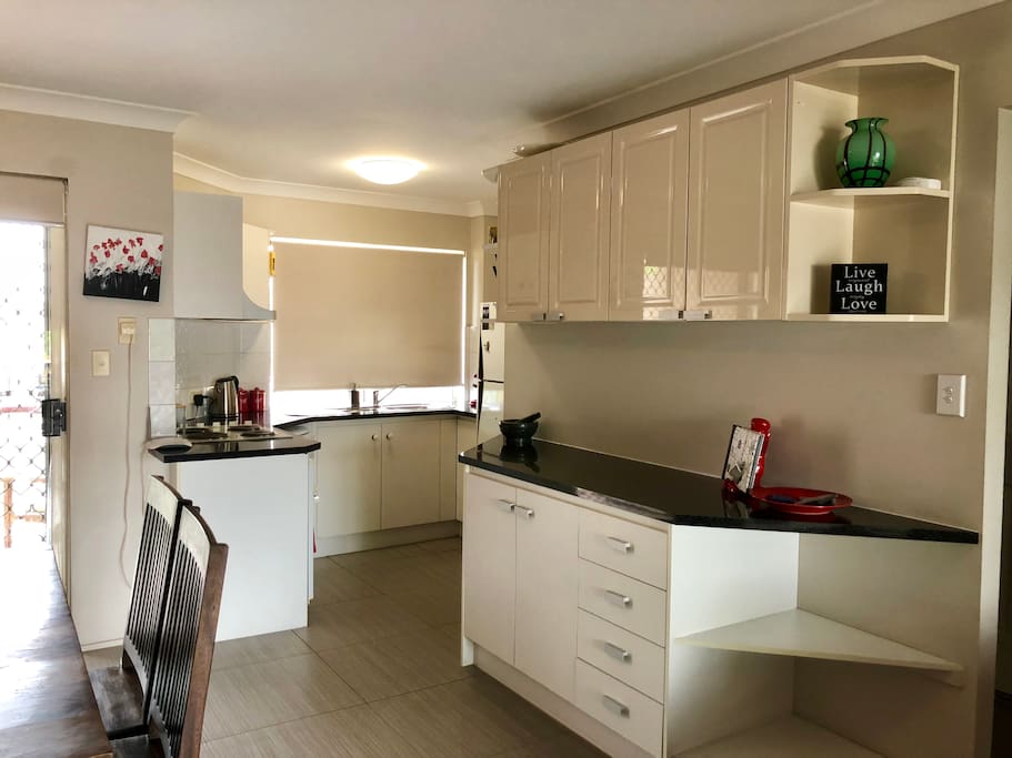 Kitchen with dishwasher, microwave, large fridge and all the kitchen utensils needed! There is unlimited wifi as well.