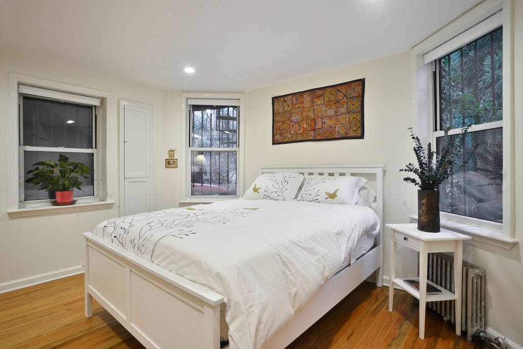 Here is the bedroom. It has a queen-sized bed.