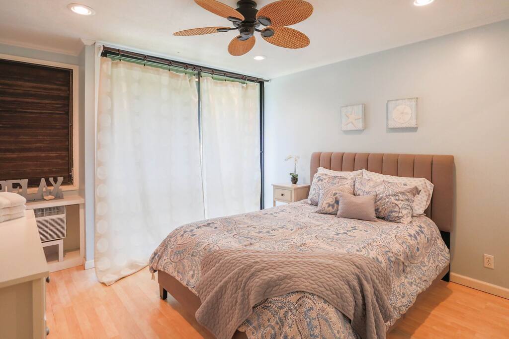 Beautiful clean bedroom with Air conditioning