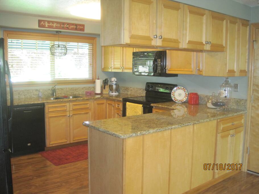 Large open kitchen with everything to cook some nice meals