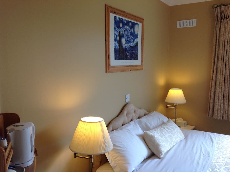 Budget double room with queen bed and full breakfast included in price.